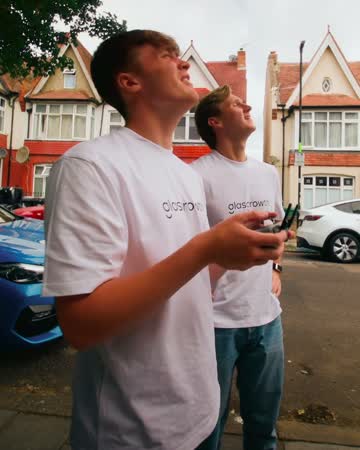 Callum and Aidan flying the drone on a job