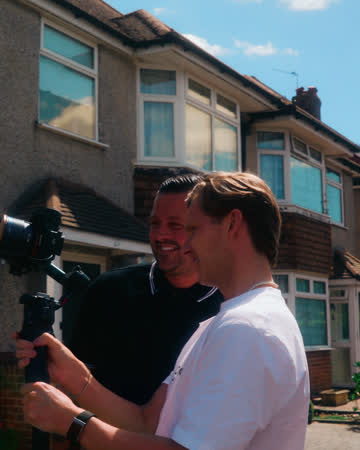 Callum filming with the owner of JBC Windows